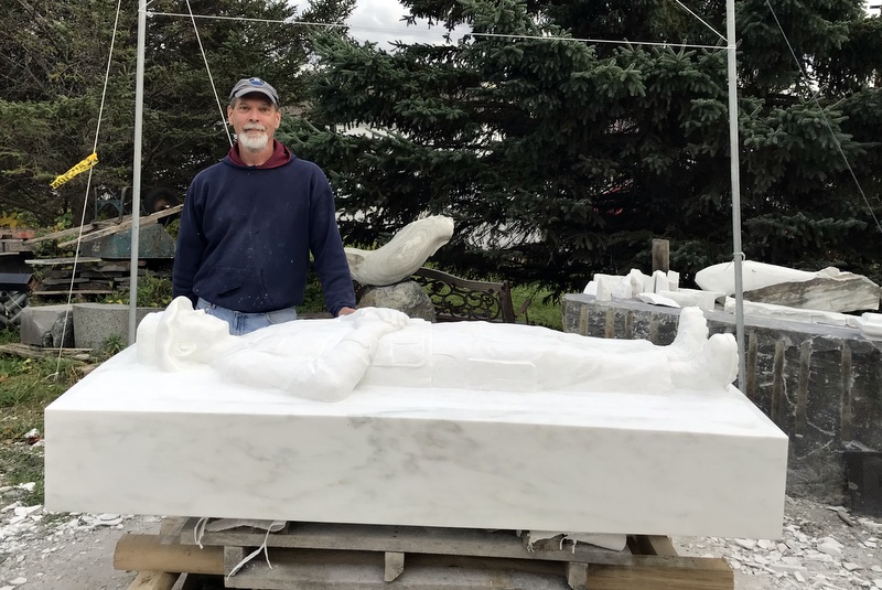 Sculptor, Don Ramey behind the new memorial preparing to move it from West Rutland